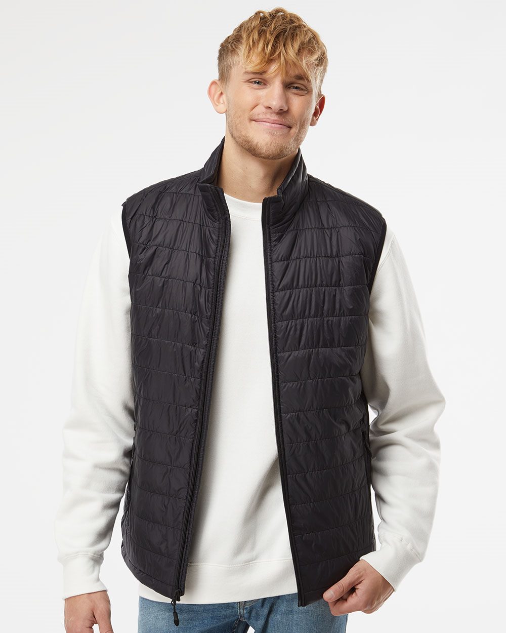 Independent Trading Co.'s Men's Puffer Vest is a wind- and water-resistant vest designed for comfort and style.