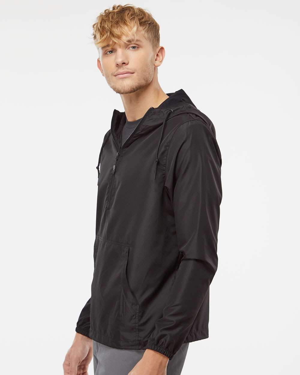 Independent Trading Co. Unisex Lightweight Quarter-Zip Windbreaker Pullover Jacket - Model Side View