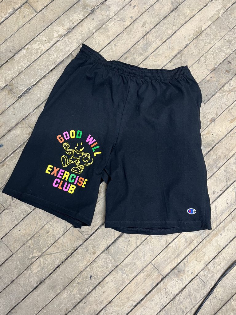 Black Champion shorts screen printed with a rainbow Good Will Exercise Club design