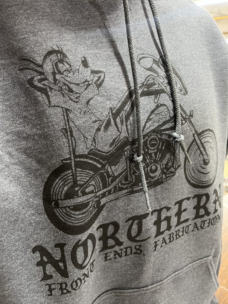 Grey hoodie with a black Northern Front Ends Fabrication print of a cartoon rider on a chopper